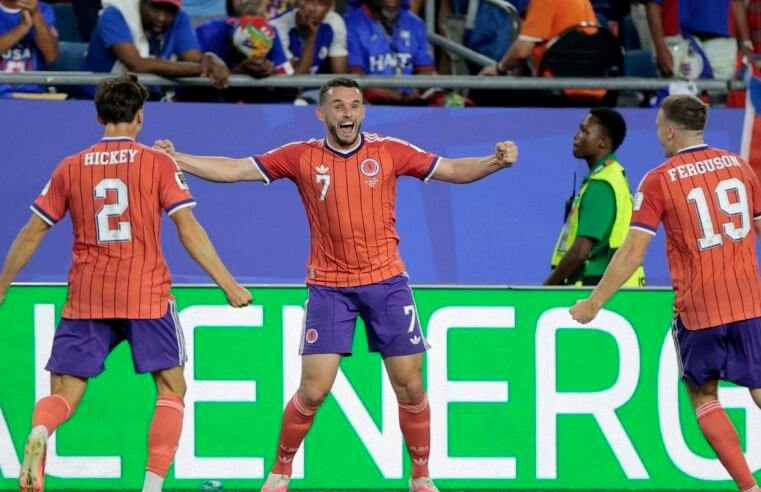 Escócia vence Haiti e vira líder do grupo do Brasil na Copa do Mundo